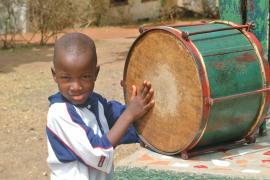Young boy playing the drum - photo: A. Gabriel