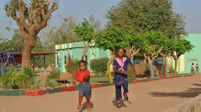 Children striking a pose for the camera - photo: C. Ashleigh