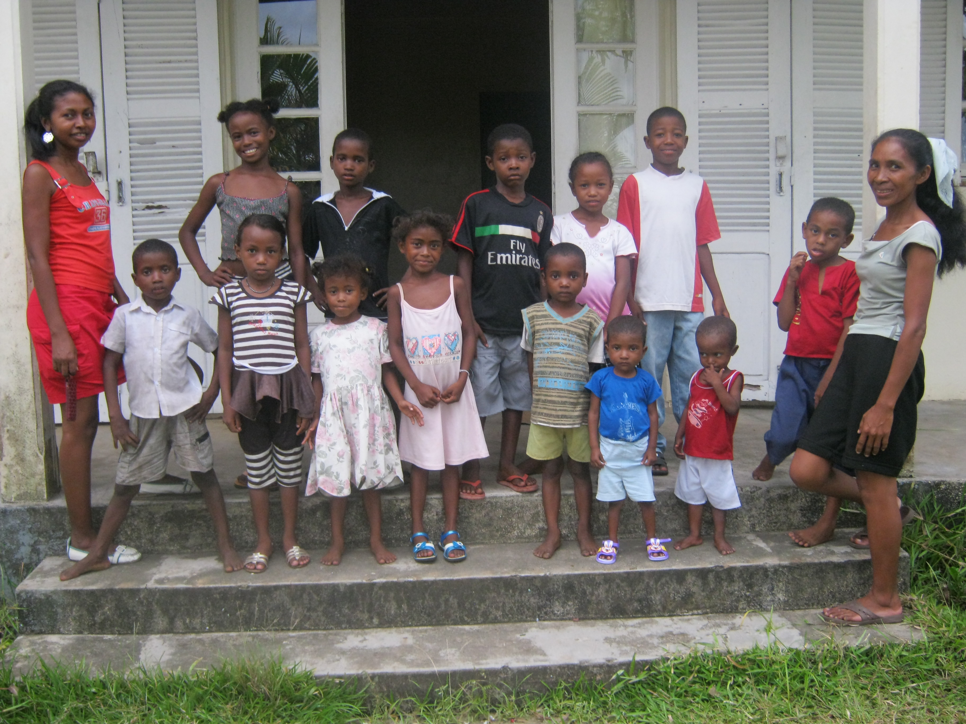 Children standing outside an SOS family home (photo: SOS archives). Children standing outside an SOS family home (photo: SOS archives).