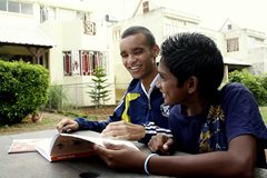 Two young men who are able to go to school thanks to SOS Children's Villages (photo: SOS archives).