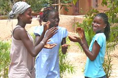 Young girls with SOS mother - photo: R. Fleischanderl