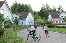 On their bikes - photo: SOS Archives