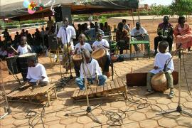 Children playing traditional instruments, SOS Children's Village Dafra - photo: N. Nabiré