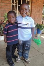 Brothers growing up together in the care of SOS Children's Villages (photo: SOS archives).