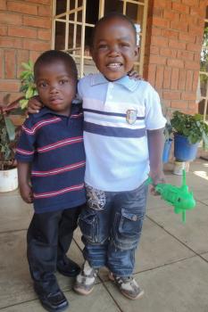 Brothers growing up together in the care of SOS Children's Villages (photo: SOS archives).