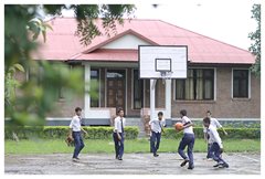 Playing basketball in their school uniforms (photo: SOS archives)