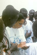SOS social workers register youths upon arrival - Photo: SOS Archives