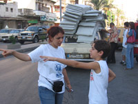 Bilal with Zeina Allouche, director of SOS Children