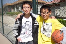 Siblings playing basketball (photo: SOS archives)