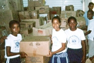 Helping to distribute supplies - Photo: SOS Archives